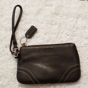 Brown leather coach wristlet